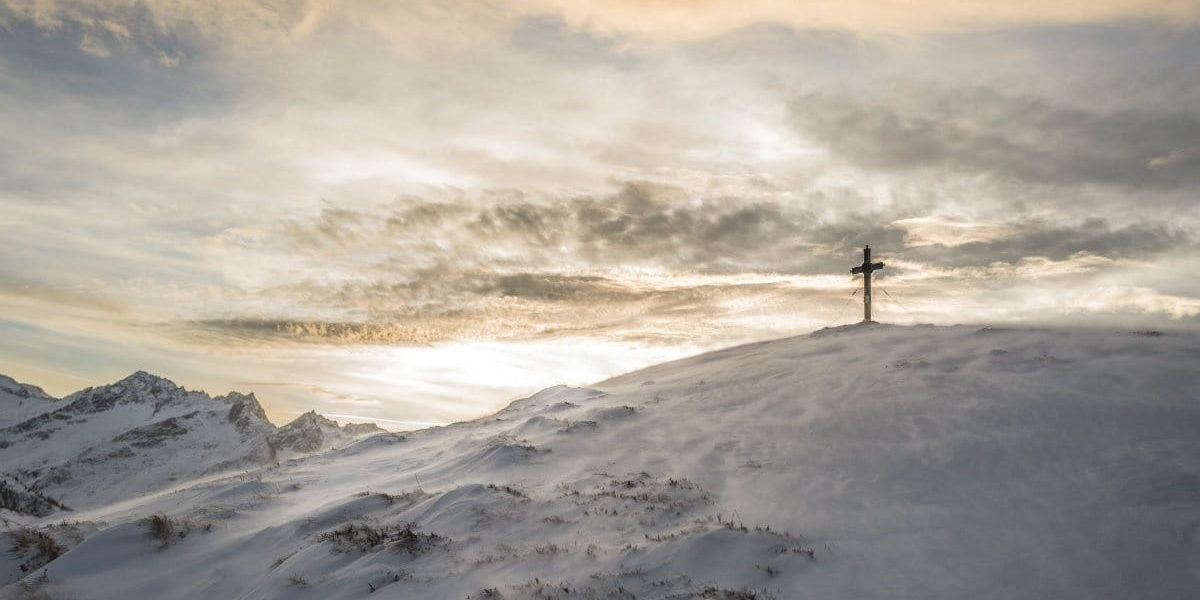 33044-cross-mountainside-snow-light.1200w.tn
